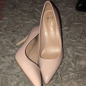 Nude patent leather pointed toe pumps